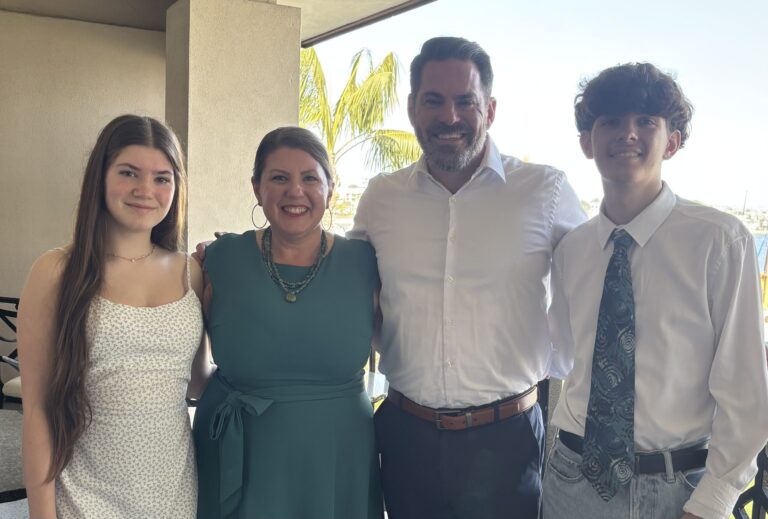 Tara Bethell with her husband and two kids
